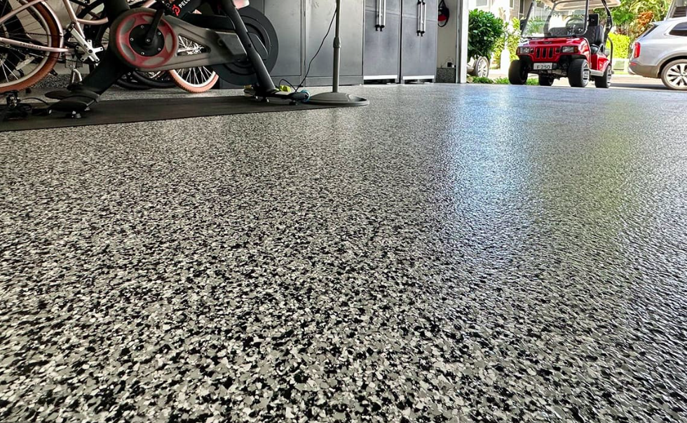 Close-up of a polyaspartic flake garage floor